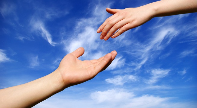 helping hand with the sky background